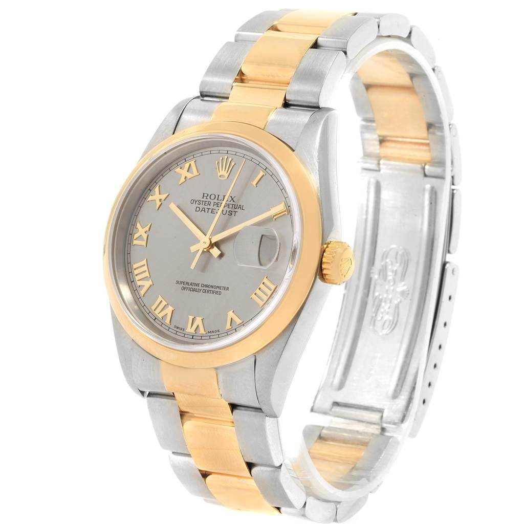 The Rolex Datejust 16203 Men's Steel and Gold (two tone) Grey Dial 16203 Men's Steel and Gold (two tone) Grey Dial is shown at a slight angle, displaying its dial, bezel, crown, and bracelet with a two-tone design.