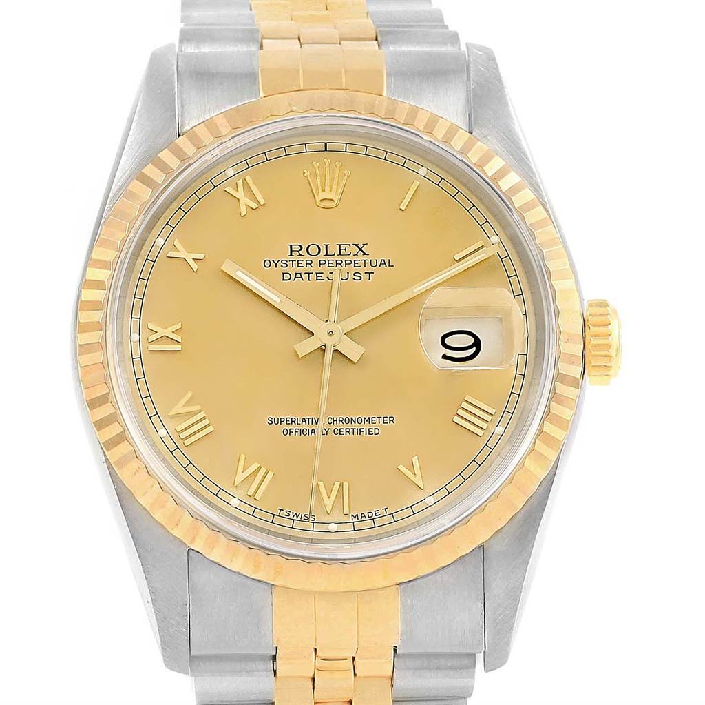This Rolex Datejust 16233 Men's Steel and Gold (two tone) Champagne Dial 16233 Men's Steel and Gold (two tone) Champagne Dial watch is shown from a top-down angle, displaying the dial, bezel, and partially the bracelet.