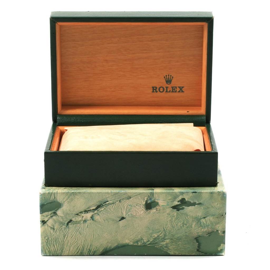 The image shows an open Rolex Datejust 16233 Men's Steel and Gold (two tone) Champagne Dial 16233 Men's Steel and Gold (two tone) Champagne Dial watch box with a pillow inside, viewed from the front.