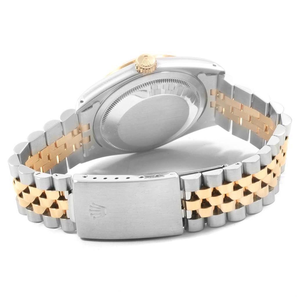 The image shows the back case, crown, and jubilee bracelet of a Rolex Datejust 16233 Men's Steel and Gold (two tone) Champagne Dial 16233 Men's Steel and Gold (two tone) Champagne Dial watch.