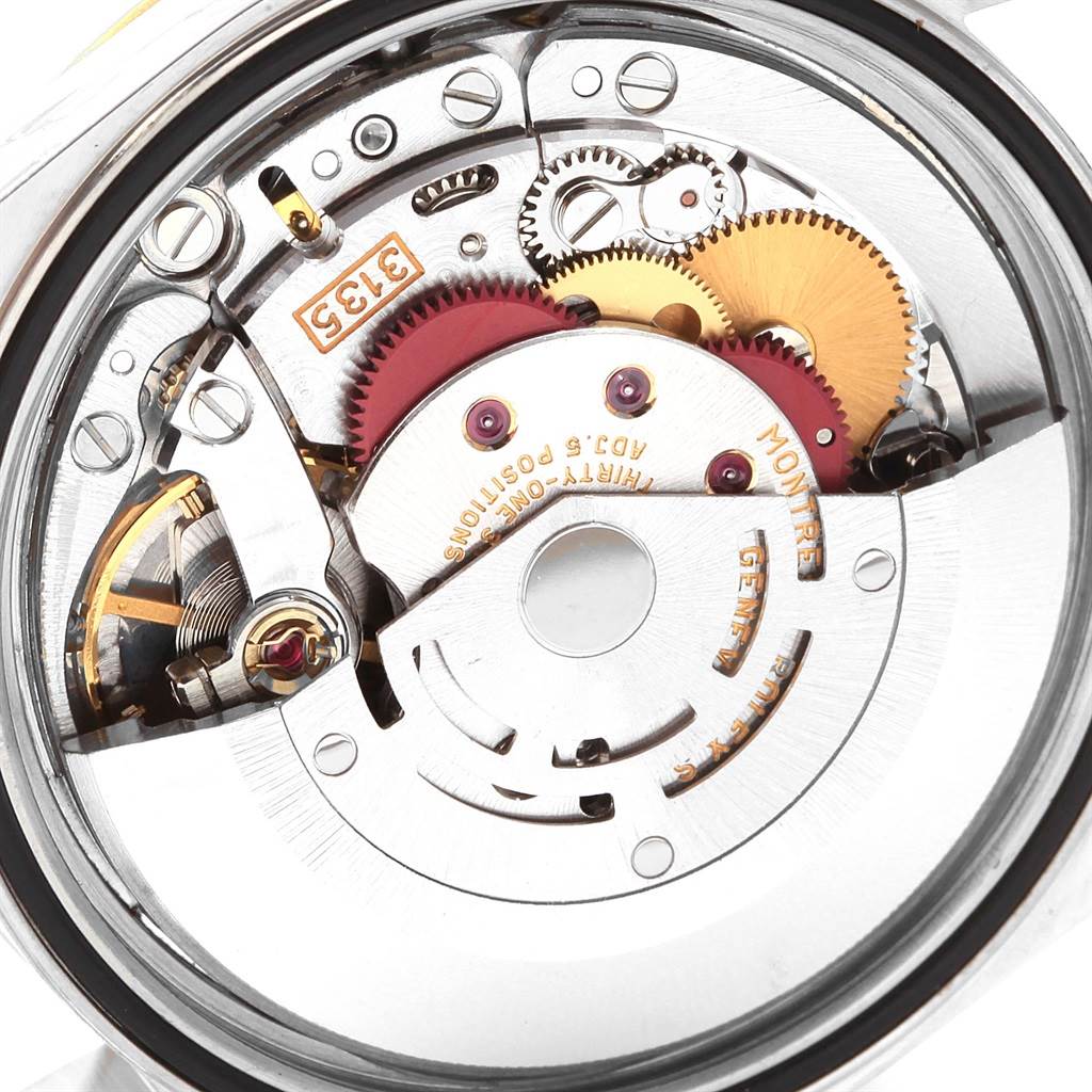 This image shows the internal movement mechanism of a Rolex Datejust 16233 Men's Steel and Gold (two tone) White Dial 16233 Men's Steel and Gold (two tone) White Dial watch from a straight, close-up angle.