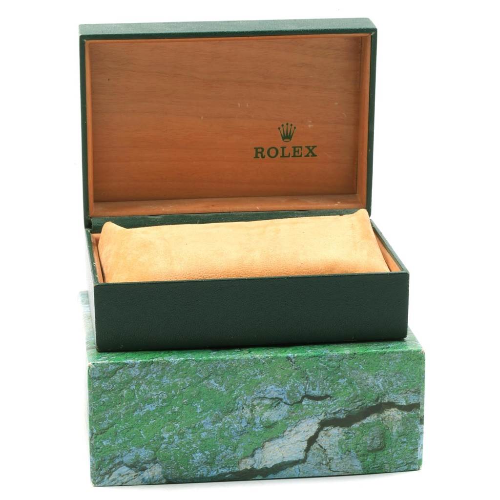 The image displays an open Rolex Datejust 16233 Men's Steel and Gold (two tone) White Dial 16233 Men's Steel and Gold (two tone) White Dial watch box with a cushion inside, viewed from a front angle.