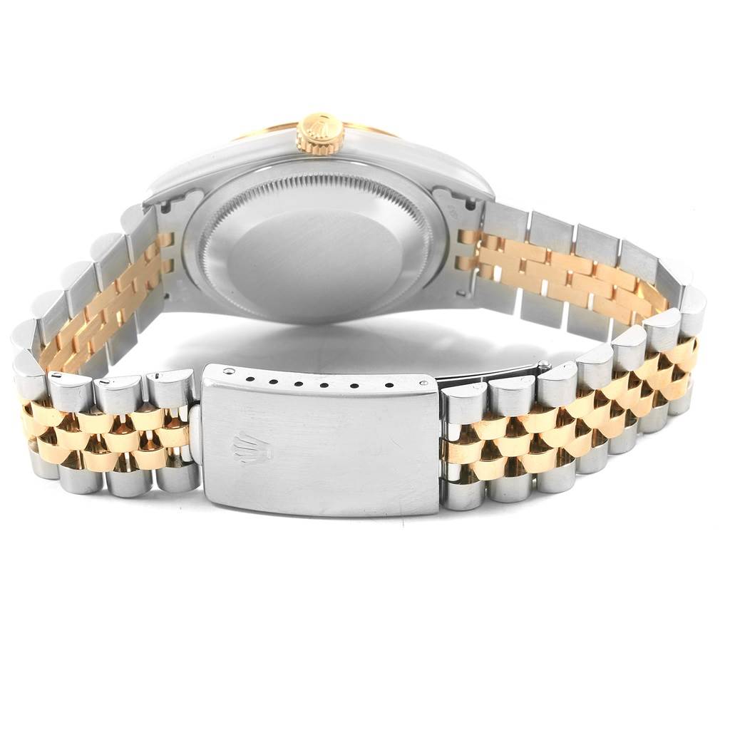 The image shows the back view of a Rolex Datejust 16233 Men's Steel and Gold (two tone) Champagne Dial 16233 Men's Steel and Gold (two tone) Champagne Dial watch, including the case back, crown, and jubilee bracelet.
