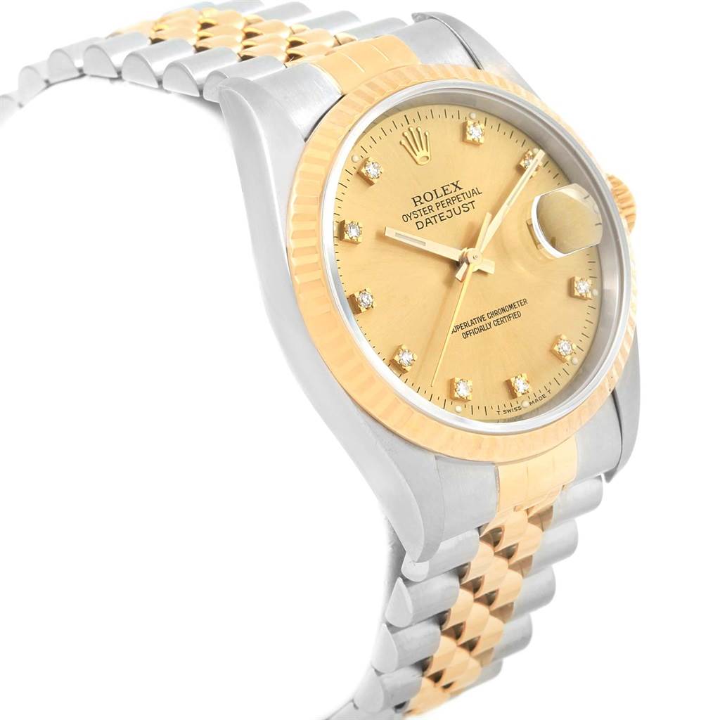 This angled view shows the face, bezel, and partial bracelet of the Rolex Datejust 16233 Men's Steel and Gold (two tone) Champagne Dial 16233 Men's Steel and Gold (two tone) Champagne Dial watch.