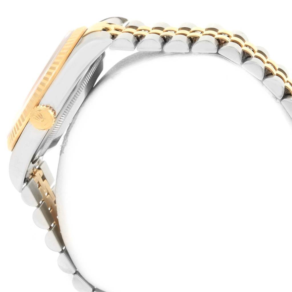 The image shows a side view of the Rolex Datejust 16233 Men's Steel and Gold (two tone) Black Dial 16233 Men's Steel and Gold (two tone) Black Dial model watch, highlighting its case, bezel, crown, and bracelet.