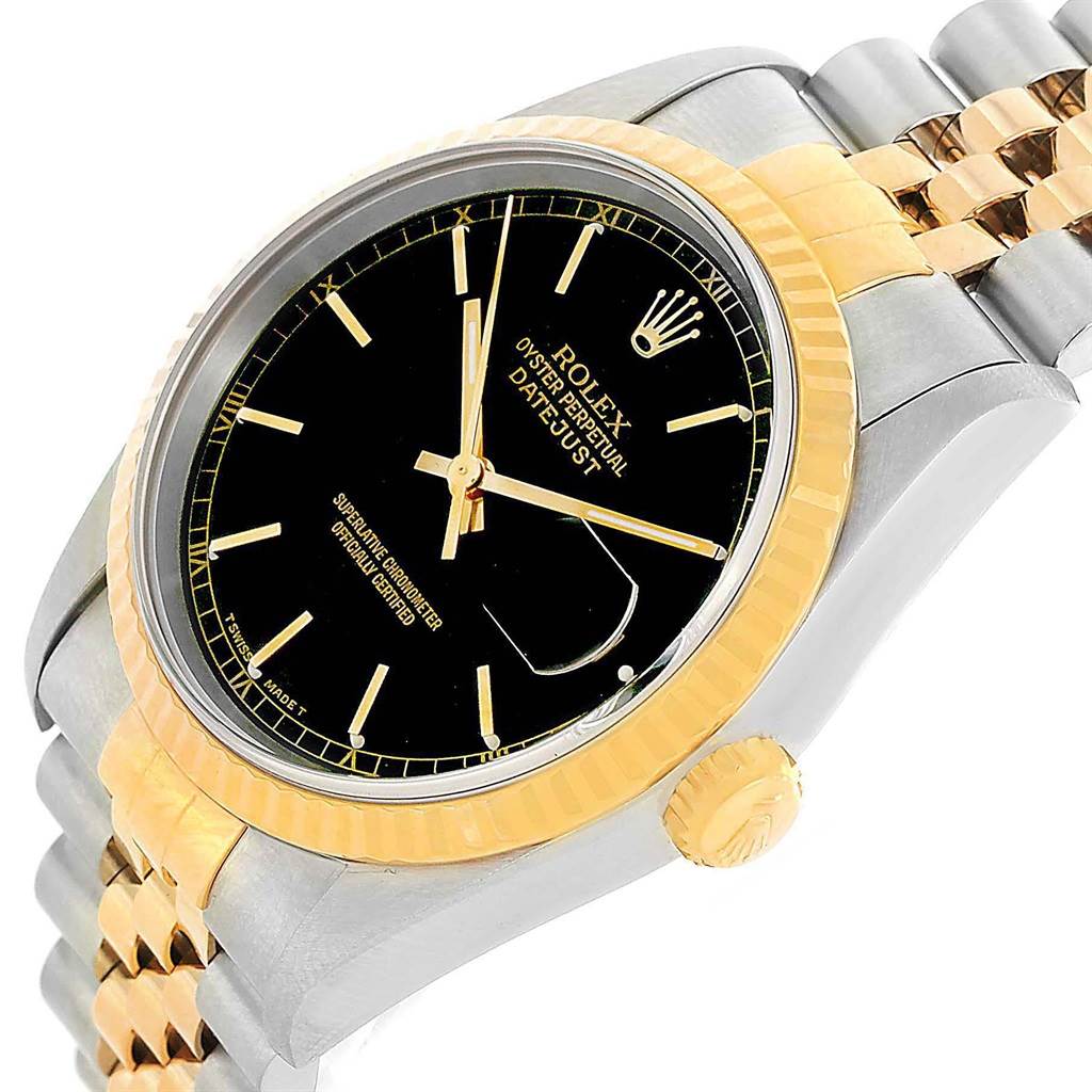 This image shows a close-up of a Rolex Datejust 16233 Men's Steel and Gold (two tone) Black Dial 16233 Men's Steel and Gold (two tone) Black Dial watch at an angle, highlighting the bezel, dial, crown, and part of the bracelet.