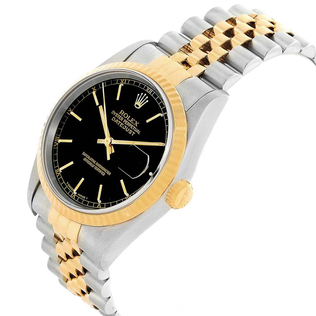 This image shows a Rolex Datejust 16233 Men's Steel and Gold (two tone) Black Dial 16233 Men's Steel and Gold (two tone) Black Dial watch with a black dial, gold bezel, gold crown, and two-tone metal bracelet at a tilted angle.
