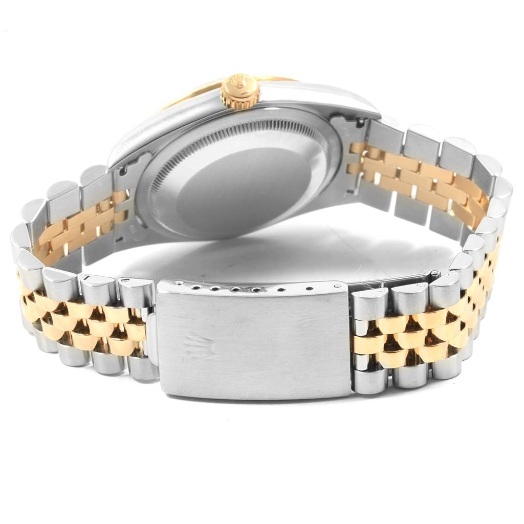 The image shows the back view of a Rolex Datejust 16233 Men's Steel and Gold (two tone) Black Dial 16233 Men's Steel and Gold (two tone) Black Dial watch, focusing on the case back and the two-tone Jubilee bracelet.