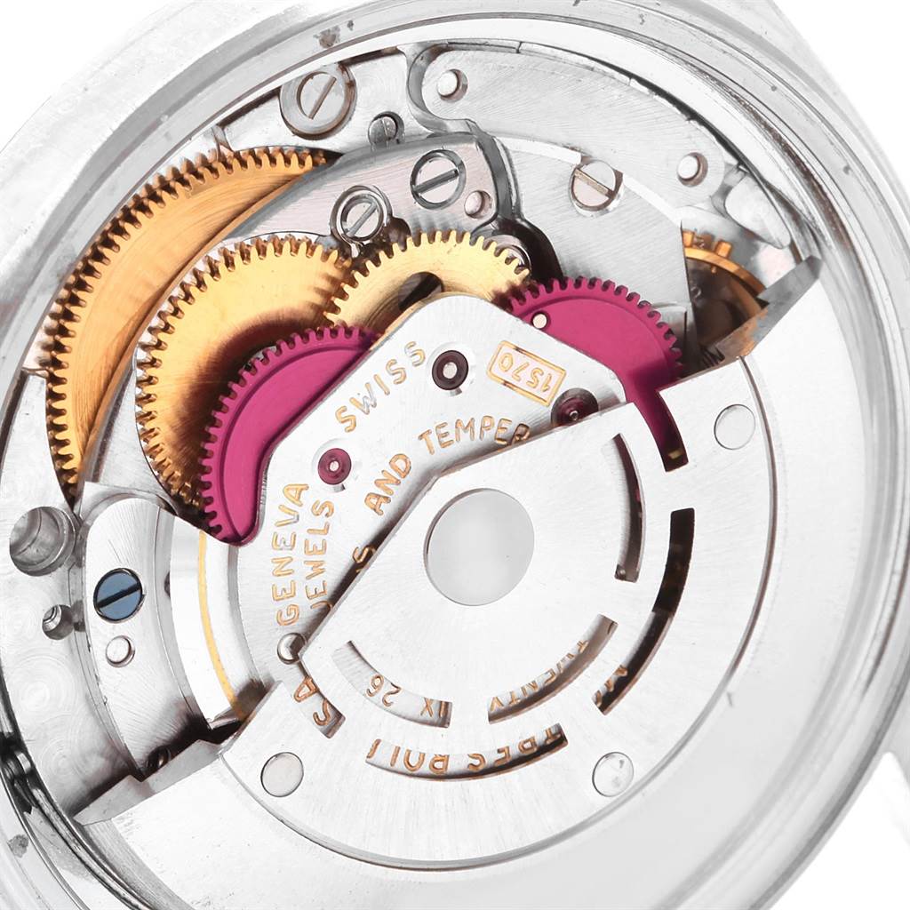 This image shows the intricate internal mechanism and gears of the Rolex Datejust 1601 Men
s Stainless Steel Silver Dial 1601 Men
s Stainless Steel Silver Dial watch model from a close-up angle.