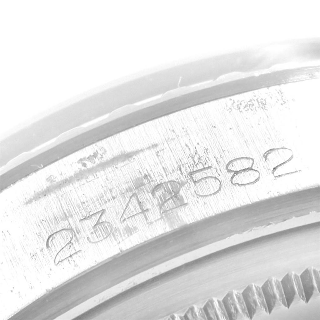 This close-up image shows the serial number engraving on the case of a Rolex Datejust 1601 Men
s Stainless Steel Silver Dial 1601 Men
s Stainless Steel Silver Dial watch.