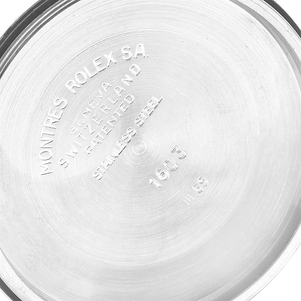 The image shows the back case of a Rolex Datejust 1601 Men
s Stainless Steel Silver Dial 1601 Men
s Stainless Steel Silver Dial watch engraved with model information and branding.