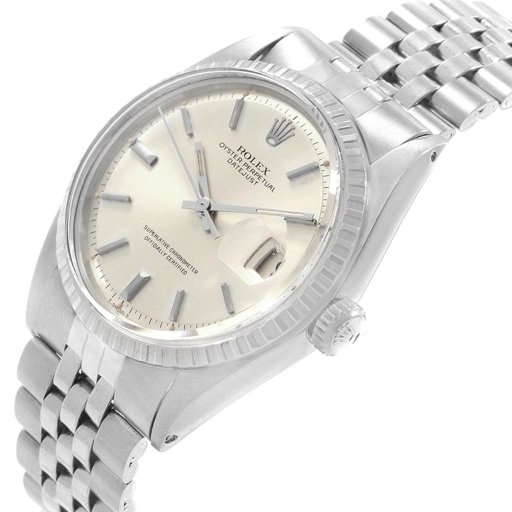 This image shows a Rolex Datejust 1601 Men
s Stainless Steel Silver Dial 1601 Men
s Stainless Steel Silver Dial watch at a tilted angle, highlighting the dial, fluted bezel, crown, and part of the bracelet.