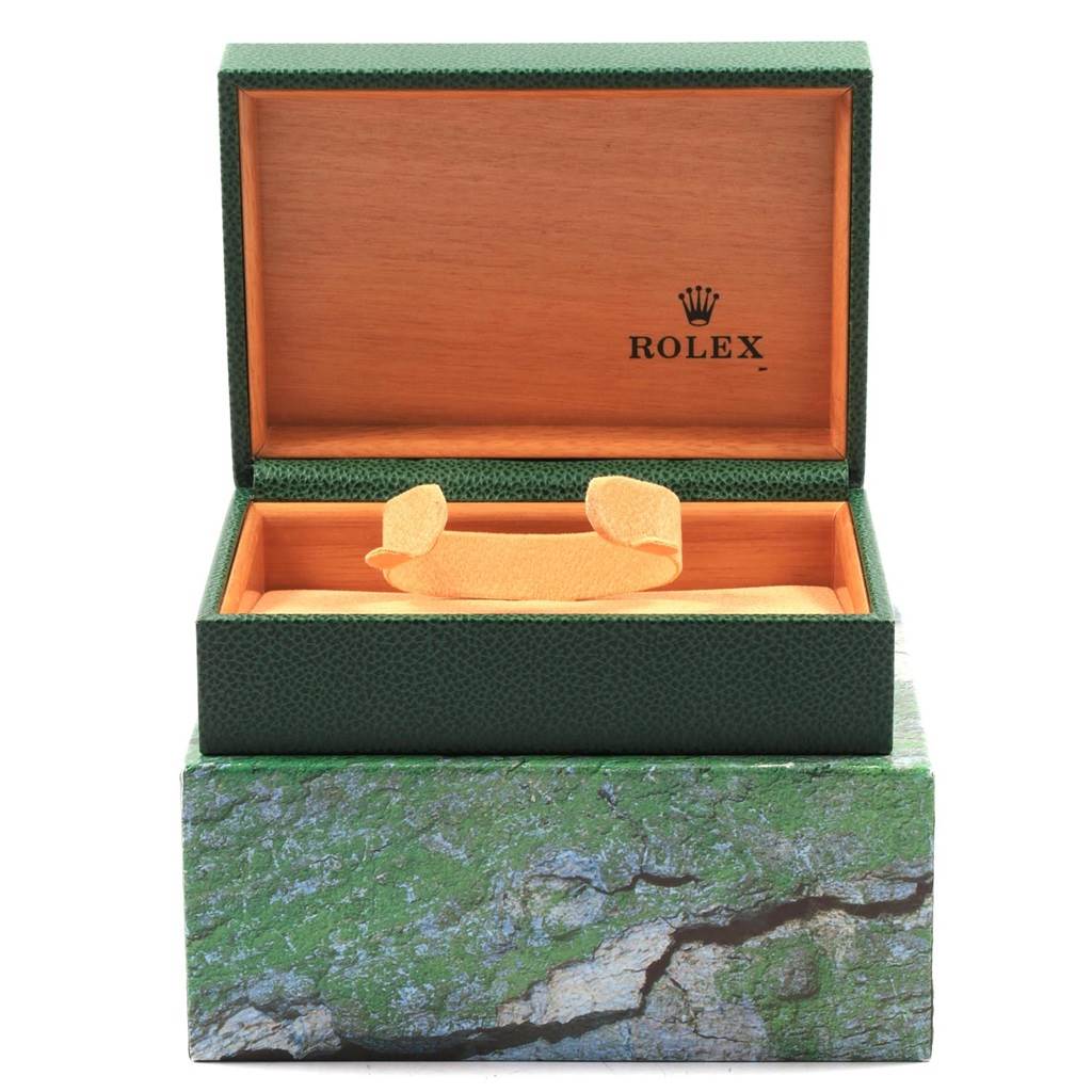 The image displays an open green and wood Rolex Datejust 16264 Men's Stainless Steel Silver Dial 16264 Men's Stainless Steel Silver Dial watch box without the watch.