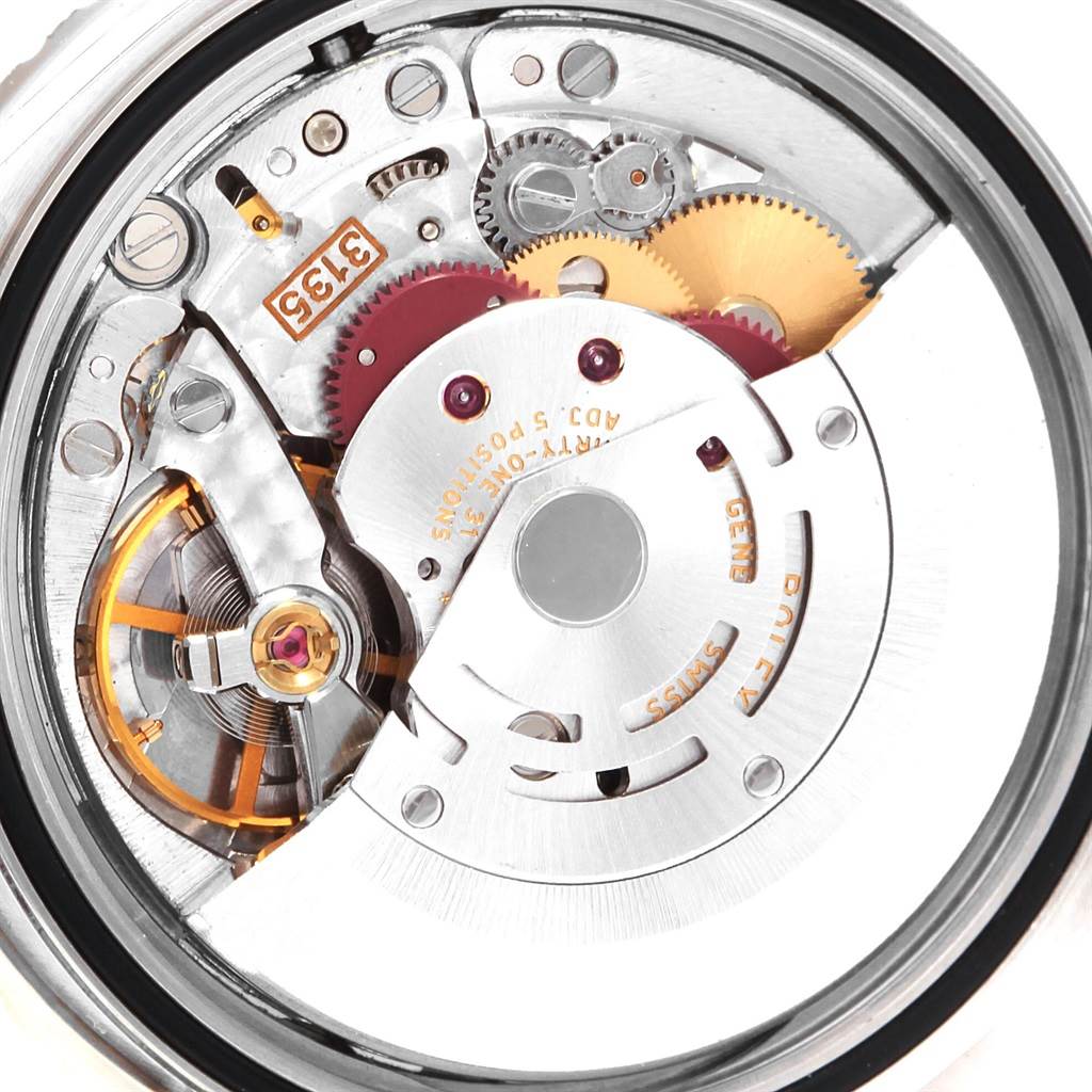 The image shows the internal mechanical movement of the Rolex Datejust 16264 Men's Stainless Steel Silver Dial 16264 Men's Stainless Steel Silver Dial watch, highlighting gears, screws, and inscriptions.