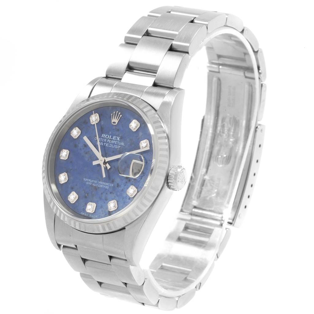 The Rolex Datejust 16234 Men
s Stainless Steel Blue Dial 16234 Men
s Stainless Steel Blue Dial watch is shown at a three-quarter angle, highlighting the face, bracelet, and crown.