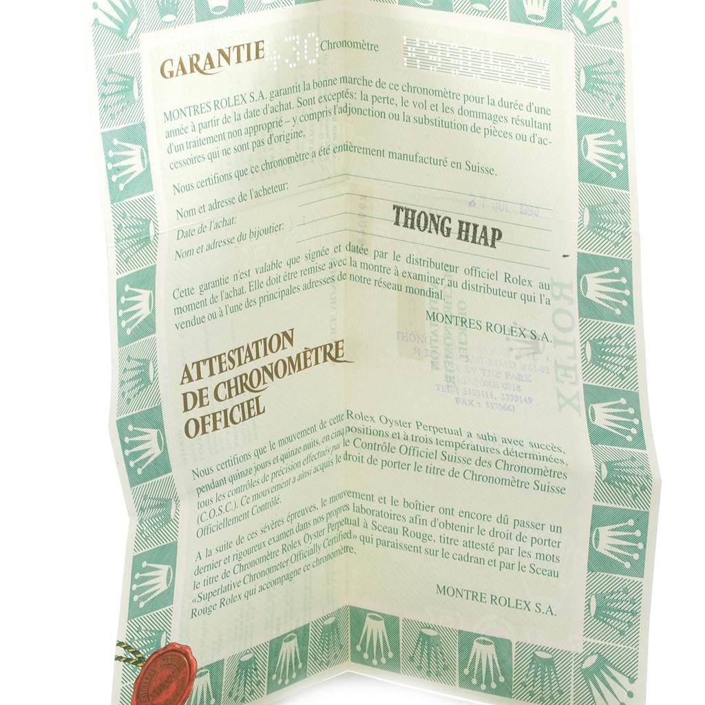 The image shows a warranty certificate for a Rolex Datejust 16233 Men's Steel and Gold (two tone) Champagne Dial 16233 Men's Steel and Gold (two tone) Champagne Dial watch.