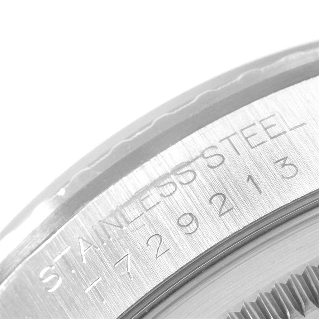 This image shows a close-up of the stainless steel case back with serial number engraving on a Rolex Datejust 16220 Men
s Stainless Steel Silver Dial 16220 Men
s Stainless Steel Silver Dial watch.