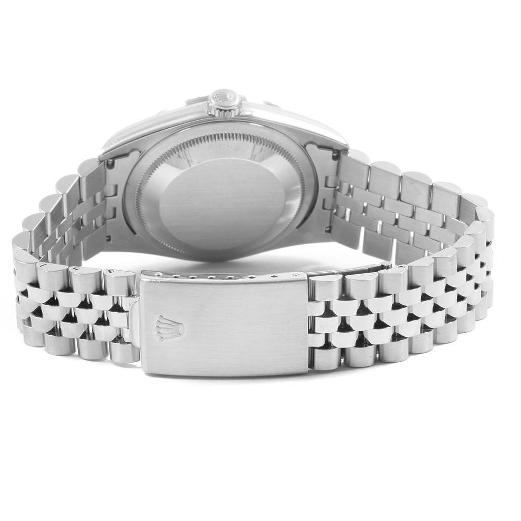 The image shows the case back and clasp of a Rolex Datejust 16220 Men
s Stainless Steel Silver Dial 16220 Men
s Stainless Steel Silver Dial watch from a rear angle.