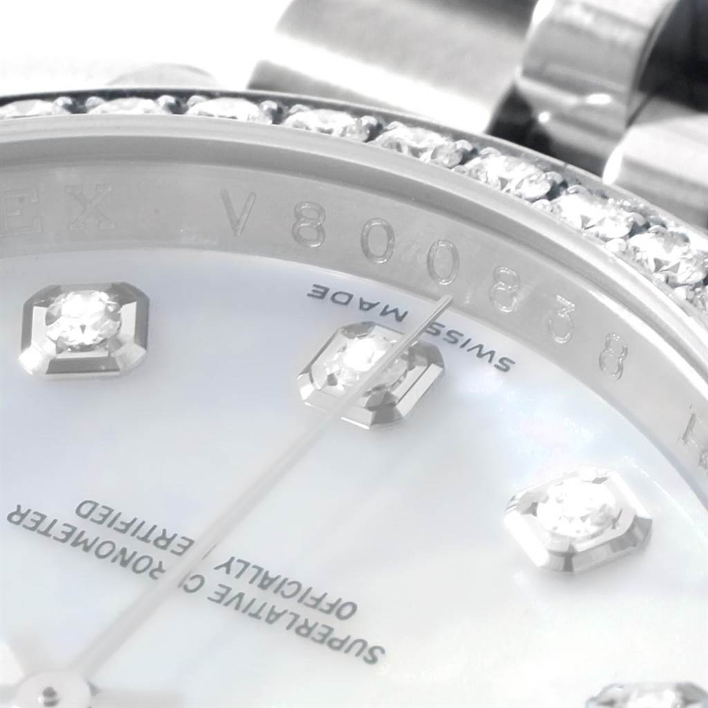 The close-up image shows the dial, diamonds, hands, bezel, and part of the serial number of a Rolex Datejust 116244 Men
s Stainless Steel Mother of Pearl Dial 116244 Men
s Stainless Steel Mother of Pearl Dial watch.