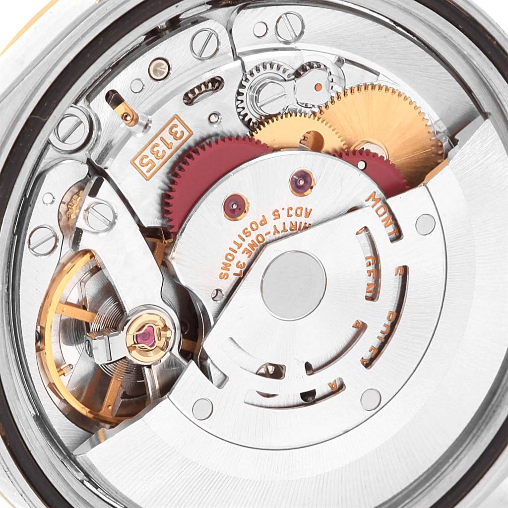 This image shows a close-up view of the internal movement mechanism of a Rolex Datejust 16203 Men's Steel and Gold (two tone) Champagne Dial 16203 Men's Steel and Gold (two tone) Champagne Dial watch.