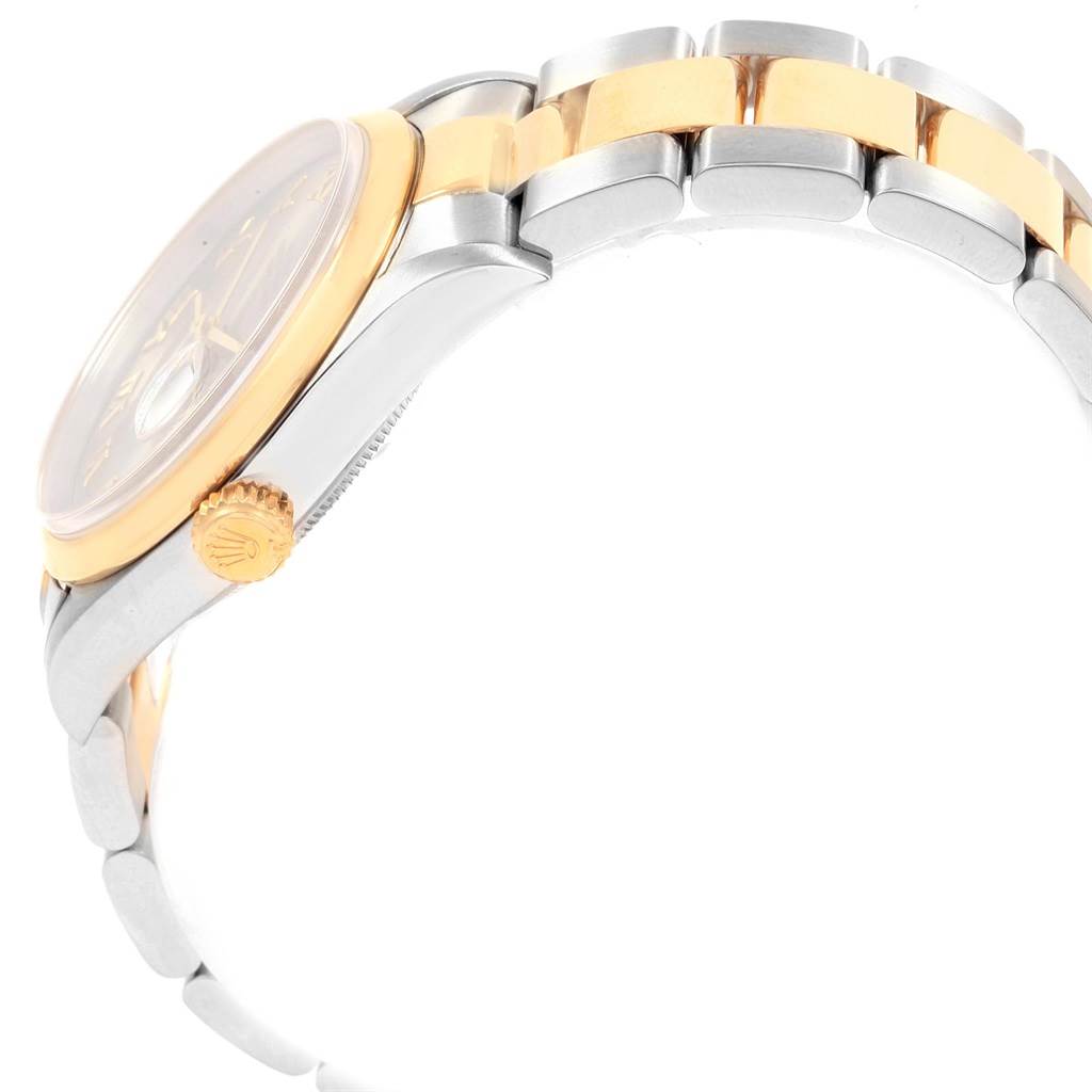 The image shows a side view of a Rolex Datejust 16203 Men's Steel and Gold (two tone) Champagne Dial 16203 Men's Steel and Gold (two tone) Champagne Dial watch, highlighting the case, bezel, crown, and part of the bracelet.