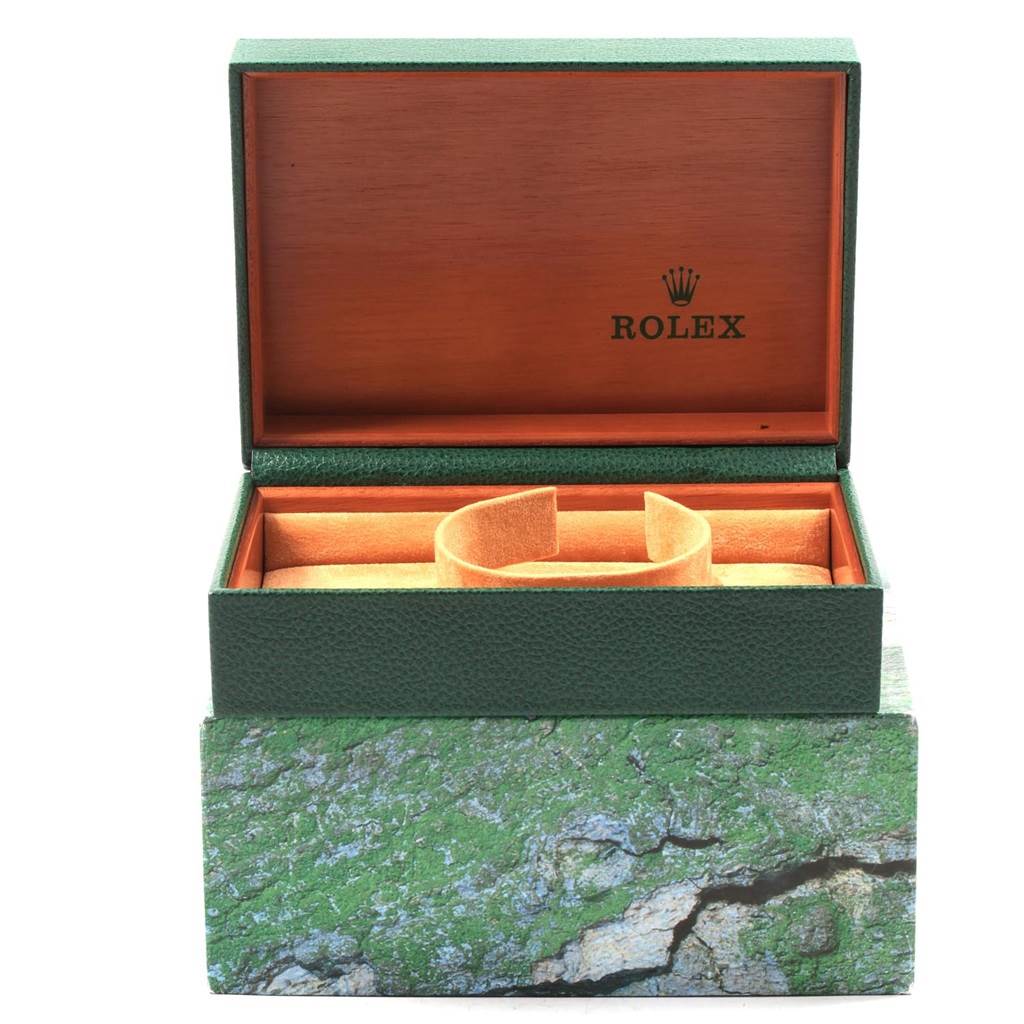 The image shows an open Rolex Datejust 16203 Men's Steel and Gold (two tone) Champagne Dial 16203 Men's Steel and Gold (two tone) Champagne Dial watch box with the green outer casing and inner beige cushion.