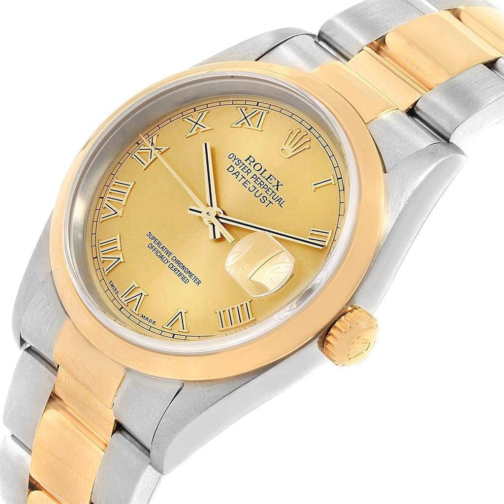 The image shows a close-up angled view of a Rolex Datejust 16203 Men's Steel and Gold (two tone) Champagne Dial 16203 Men's Steel and Gold (two tone) Champagne Dial, featuring its gold Roman numeral dial and two-tone bracelet.