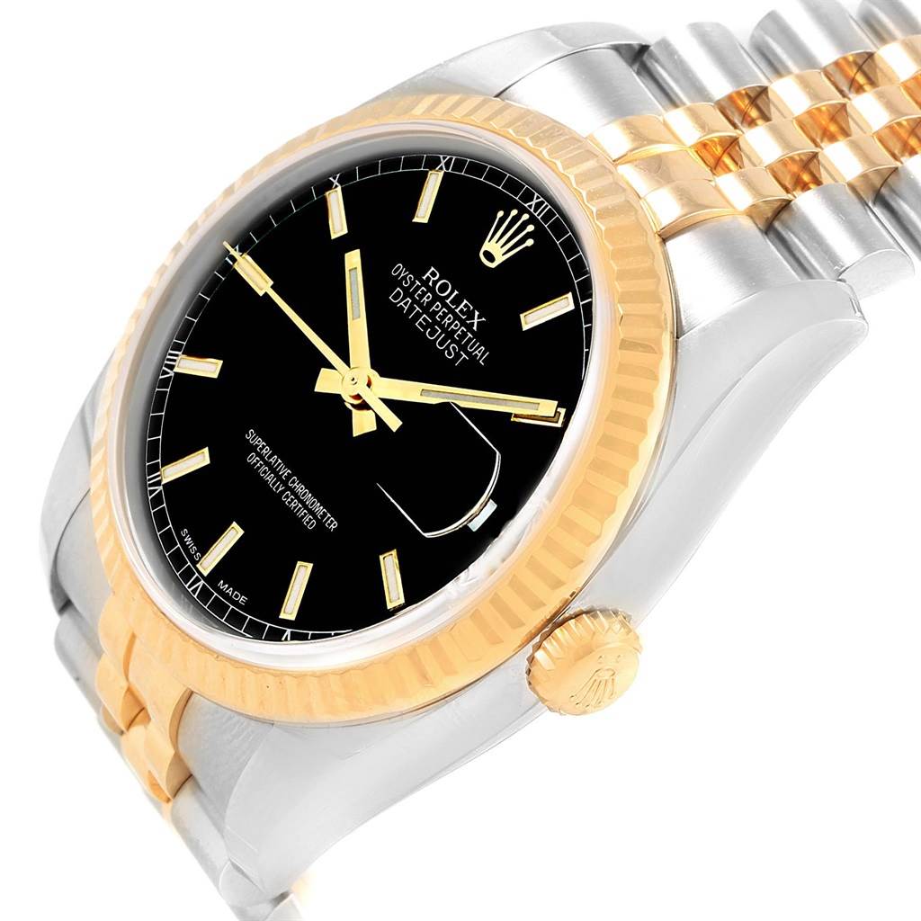 This Rolex Datejust 116233 Men's Stainless Steel Black Dial 116233 Men's Stainless Steel Black Dial watch is shown from an angled top view highlighting the black dial and gold fluted bezel.
