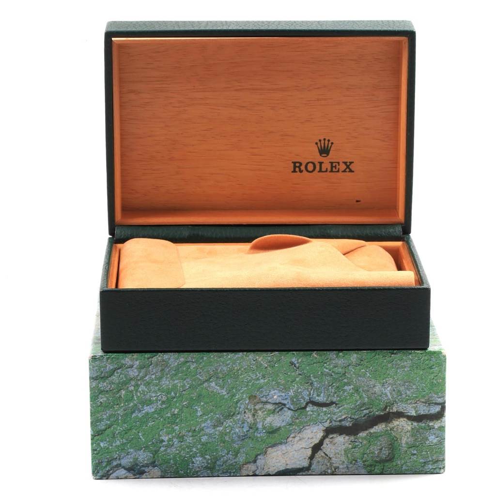 The image shows an open Rolex Datejust 16233 Men
s Steel and Gold (two tone) White Dial 16233 Men
s Steel and Gold (two tone) White Dial watch box with a plush cushion.