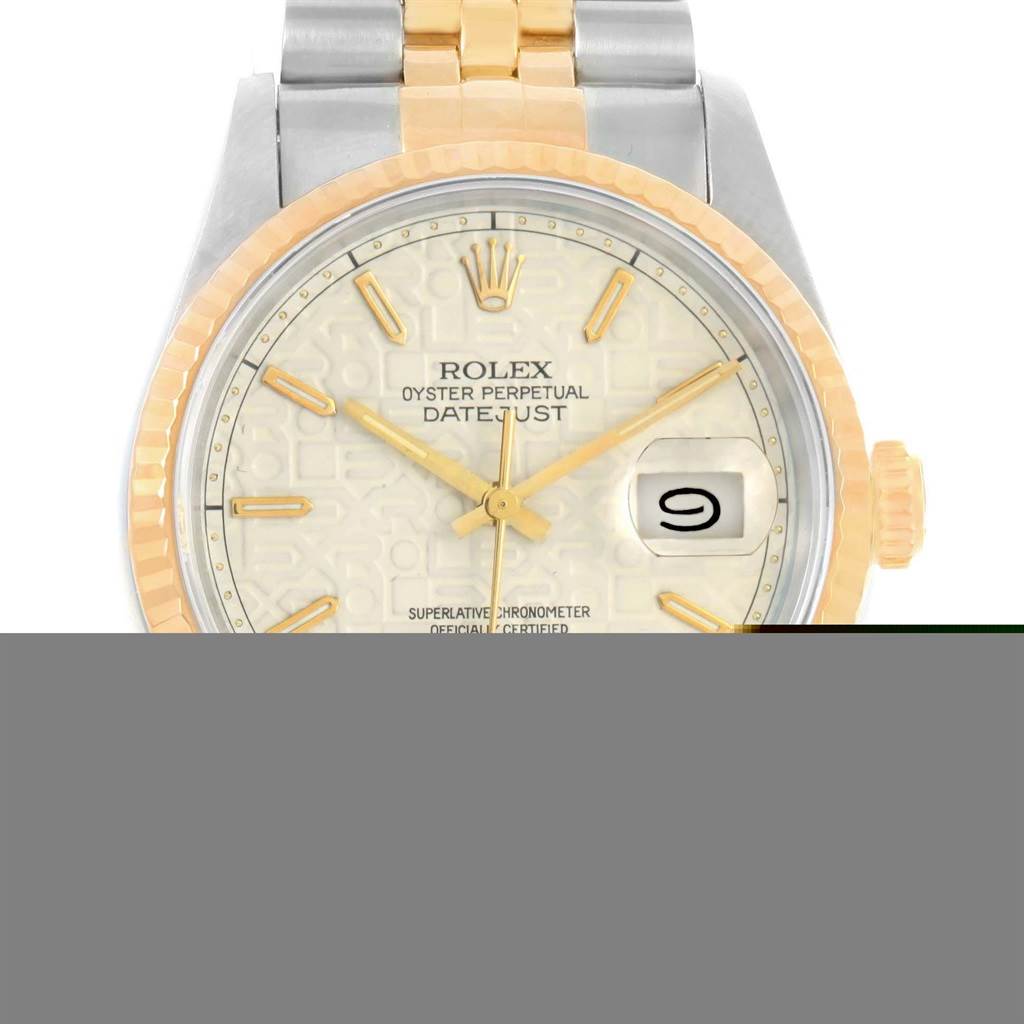 The image shows the front view of a Rolex Datejust 16233 Men's Steel and Gold (two tone) Beige Dial 16233 Men's Steel and Gold (two tone) Beige Dial watch, highlighting its dial, bezel, and part of its bracelet.