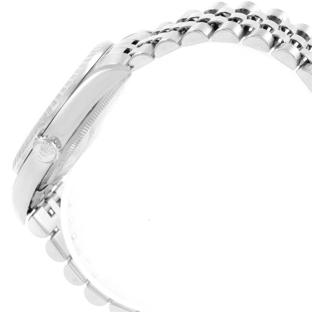 This image shows a side view of the Rolex Datejust 16220 Men
s Stainless Steel Silver Dial 16220 Men
s Stainless Steel Silver Dial watch, highlighting its crown, case, and bracelet.