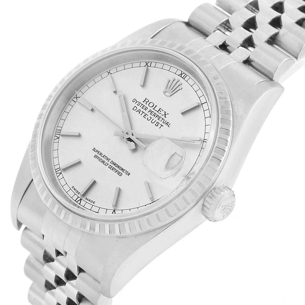 The image shows a Rolex Datejust 16220 Men
s Stainless Steel Silver Dial 16220 Men
s Stainless Steel Silver Dial watch at an angled view, displaying the face, crown, and part of the bracelet.