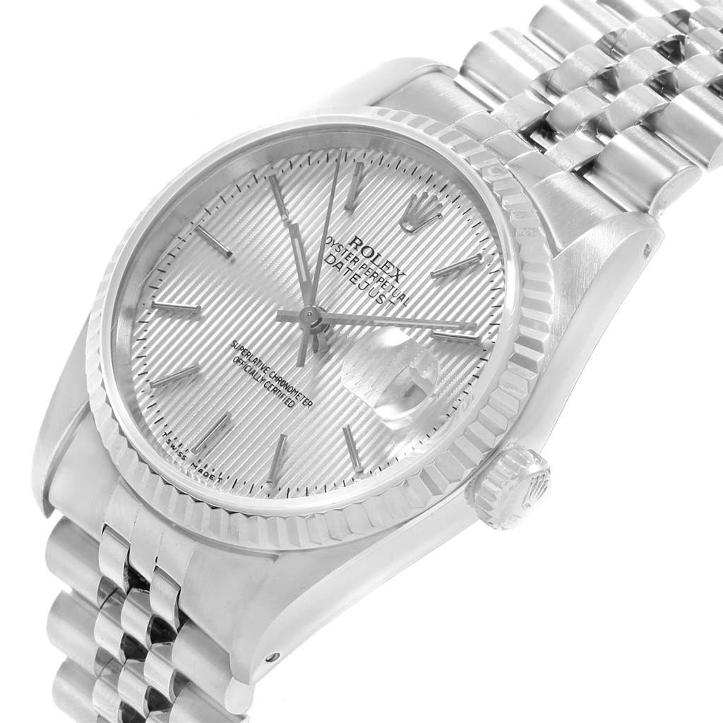 The Rolex Datejust 16234 Men's Stainless Steel Silver Dial 16234 Men's Stainless Steel Silver Dial watch in the image is shown at an angle, highlighting the face, bezel, crown, and part of the bracelet.