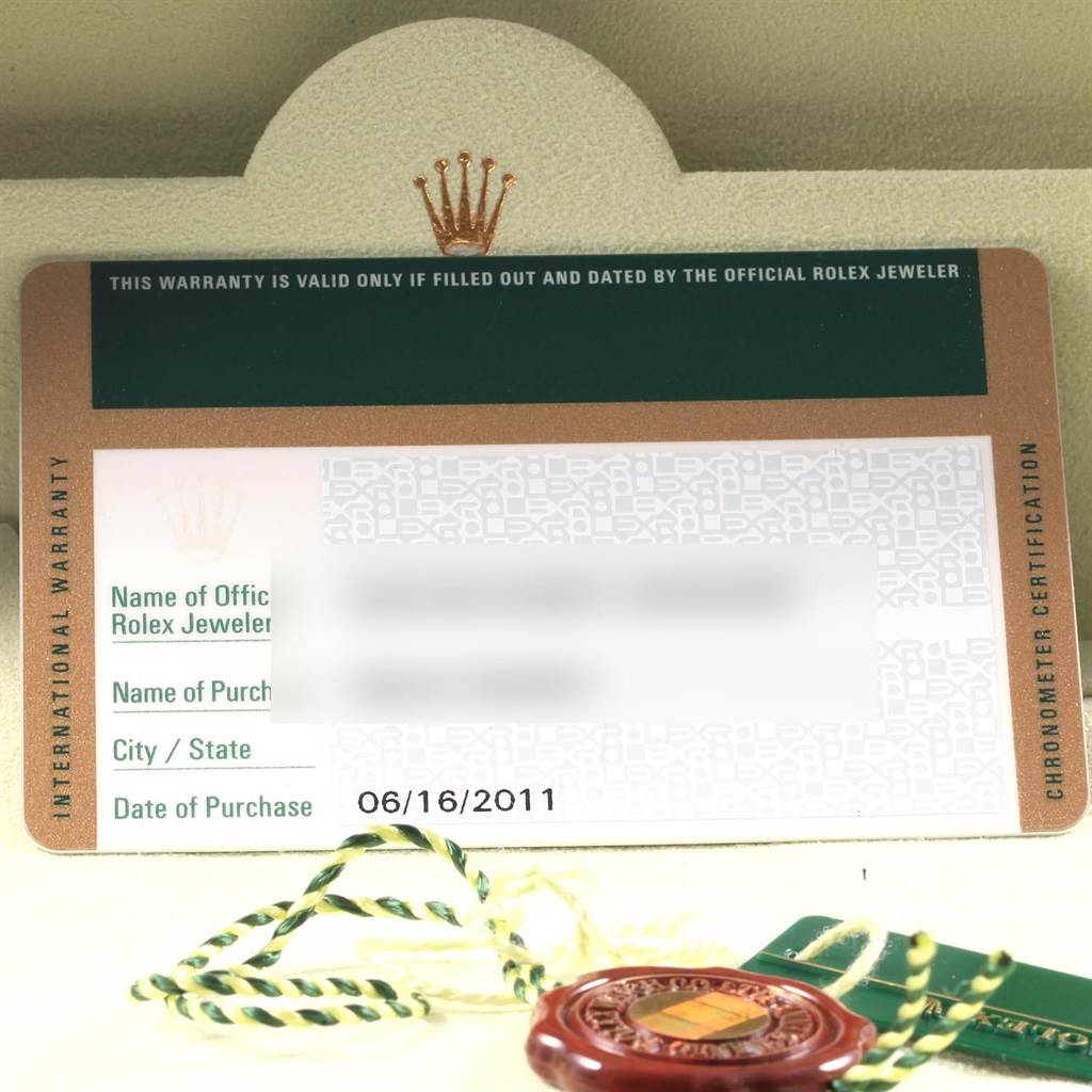 The image shows the international warranty card and certification tag for a Rolex Datejust 116200 Men's Stainless Steel Silver Dial 116200 Men's Stainless Steel Silver Dial watch.