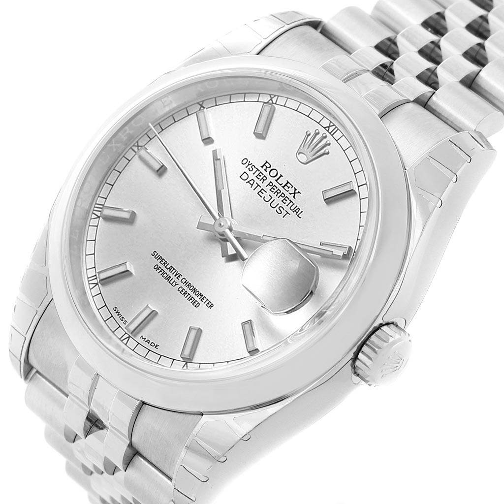 The image shows a close-up view of the dial, crown, and part of the bracelet of a Rolex Datejust 116200 Men's Stainless Steel Silver Dial 116200 Men's Stainless Steel Silver Dial watch.