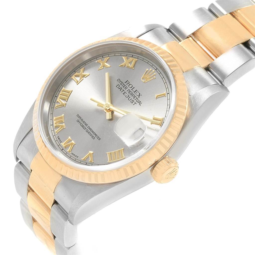 The image shows a Rolex Datejust 20208 Men
s Steel and Gold (two tone) Grey Dial 20208 Men
s Steel and Gold (two tone) Grey Dial watch from an angled view, highlighting the dial, bezel, and two-tone bracelet.