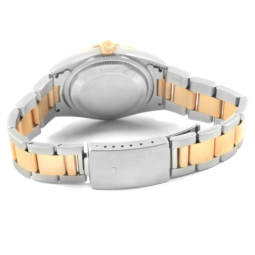 This image shows the back angle of a Rolex Datejust 20208 Men
s Steel and Gold (two tone) Grey Dial 20208 Men
s Steel and Gold (two tone) Grey Dial watch, highlighting its case back, bracelet, and clasp.