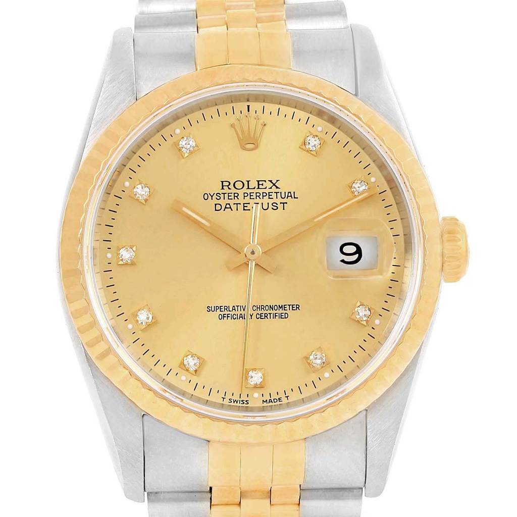 This image shows a close-up, front view of a Rolex Datejust 16233 Men
s Steel and Gold (two tone) Champagne Dial 16233 Men
s Steel and Gold (two tone) Champagne Dial watch, highlighting the dial, bezel, and part of the bracelet.