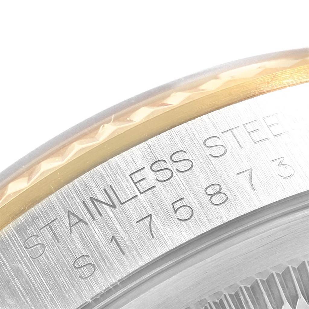 This is a close-up angle of the bezel and serial number engraving on a Rolex Datejust 16233 Men
s Steel and Gold (two tone) Champagne Dial 16233 Men
s Steel and Gold (two tone) Champagne Dial watch.