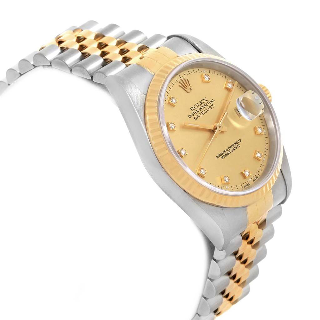 This image shows the Rolex Datejust 16233 Men
s Steel and Gold (two tone) Champagne Dial 16233 Men
s Steel and Gold (two tone) Champagne Dial watch at a slight angle, highlighting the watch’s face, bezel, and part of the bracelet.