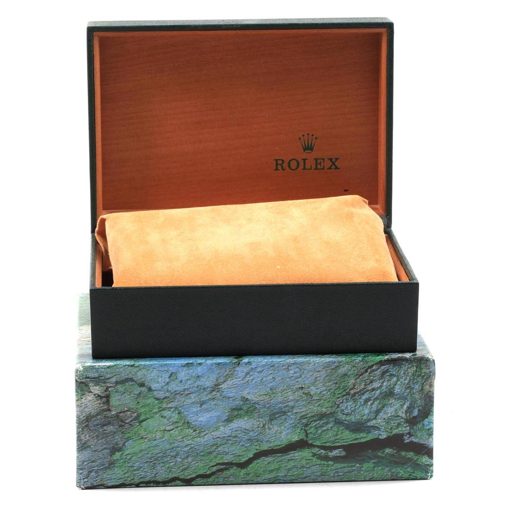 This image shows the open packaging box for a Rolex Datejust 16233 Men
s Steel and Gold (two tone) Beige Dial 16233 Men
s Steel and Gold (two tone) Beige Dial watch, displaying the inner cushion.