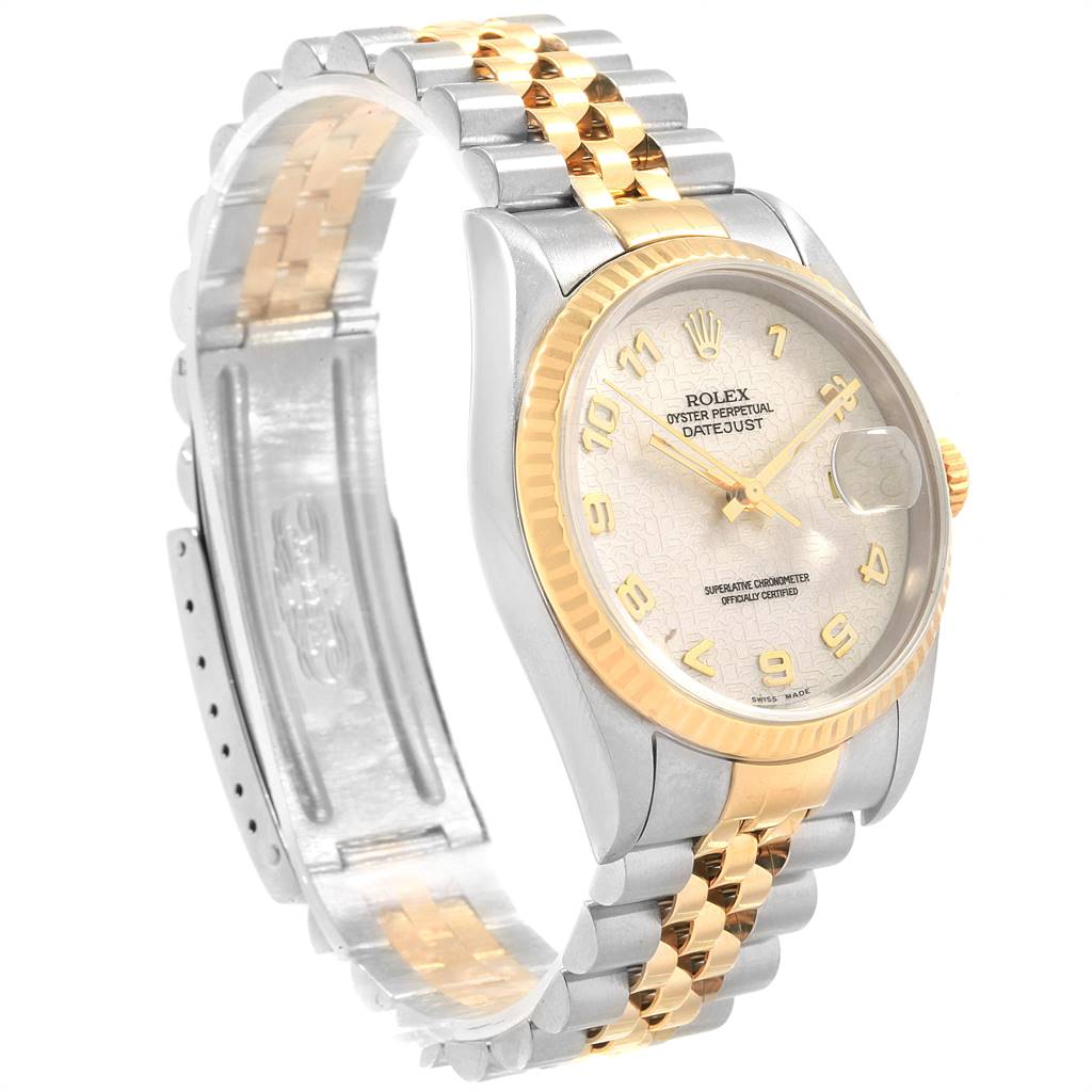 The Rolex Datejust 16233 Men
s Steel and Gold (two tone) Beige Dial 16233 Men
s Steel and Gold (two tone) Beige Dial watch is shown at a three-quarter angle, highlighting its dual-tone bracelet and face details.