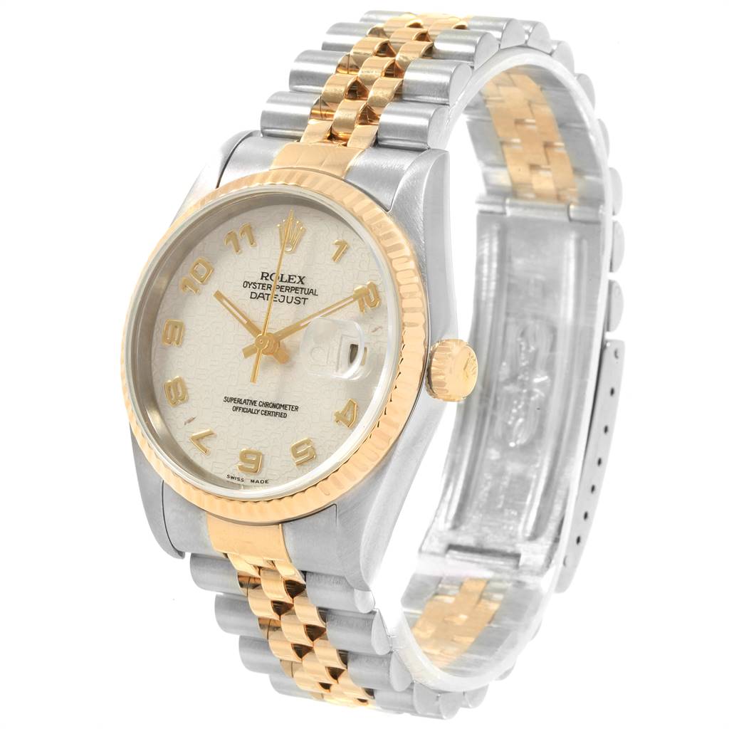 The Rolex Datejust 16233 Men
s Steel and Gold (two tone) Beige Dial 16233 Men
s Steel and Gold (two tone) Beige Dial watch is shown from a front angle, highlighting its dial, bezel, and two-tone bracelet.