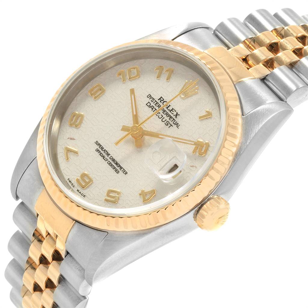 The image shows a Rolex Datejust 16233 Men
s Steel and Gold (two tone) Beige Dial 16233 Men
s Steel and Gold (two tone) Beige Dial watch from an angled perspective, highlighting its dial, bezel, crown, and bracelet.