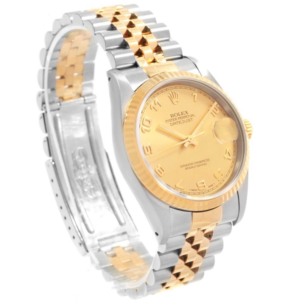 The image displays a Rolex Datejust 16233 Men
s Steel and Gold (two tone) Champagne Dial 16233 Men
s Steel and Gold (two tone) Champagne Dial watch at a three-quarter angle, showcasing the face, bezel, and two-tone bracelet.