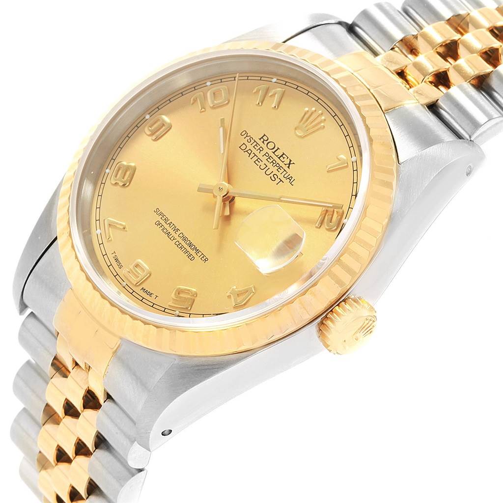 The image shows a Rolex Datejust 16233 Men
s Steel and Gold (two tone) Champagne Dial 16233 Men
s Steel and Gold (two tone) Champagne Dial watch at a slight angle, highlighting its gold dial, fluted bezel, and two-tone Jubilee bracelet.