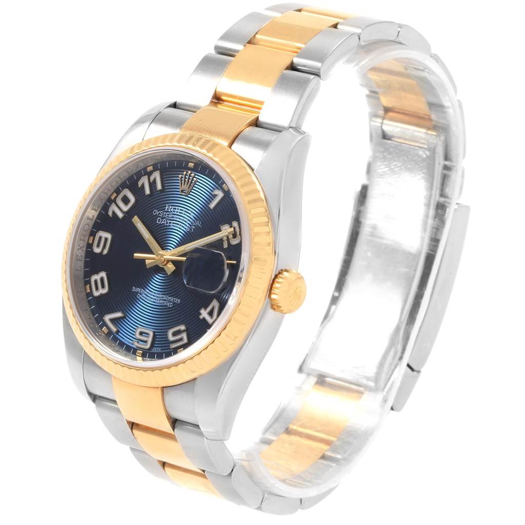 The image shows a Rolex Datejust 116233 Men
s Stainless Steel Blue Dial 116233 Men
s Stainless Steel Blue Dial watch at an angle highlighting the face, crown, and part of the bracelet.