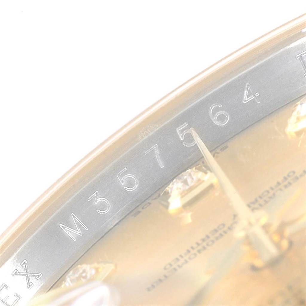 The image shows a close-up of the serial number engraved on the inner bezel of a Rolex Datejust 116233 Men's Stainless Steel Champagne Dial 116233 Men's Stainless Steel Champagne Dial watch.