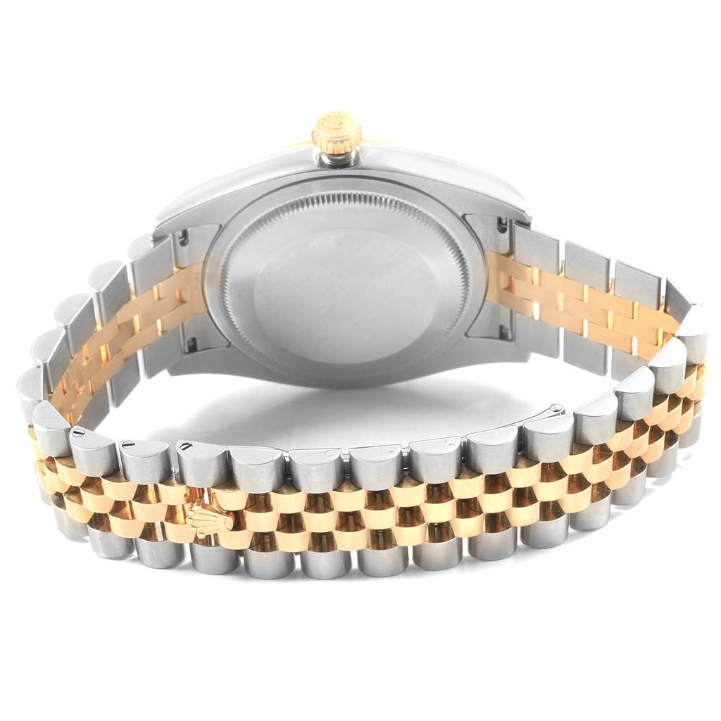 The image shows the back case and bracelet of a Rolex Datejust 116233 Men's Stainless Steel Champagne Dial 116233 Men's Stainless Steel Champagne Dial watch, featuring a two-tone silver and gold design.