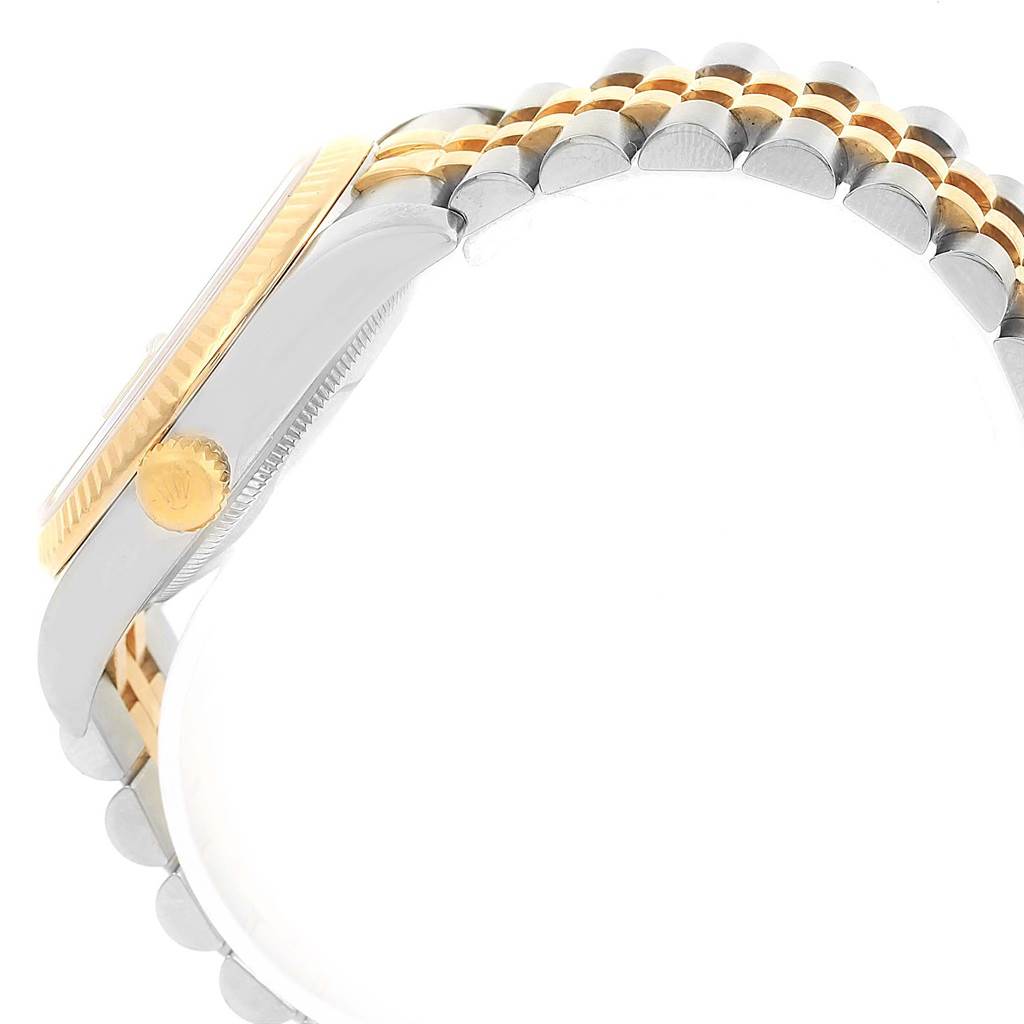 This side-angle view of the Rolex Datejust 116233 Men's Stainless Steel Champagne Dial 116233 Men's Stainless Steel Champagne Dial watch shows part of the case, crown, bezel, and jubilee bracelet.